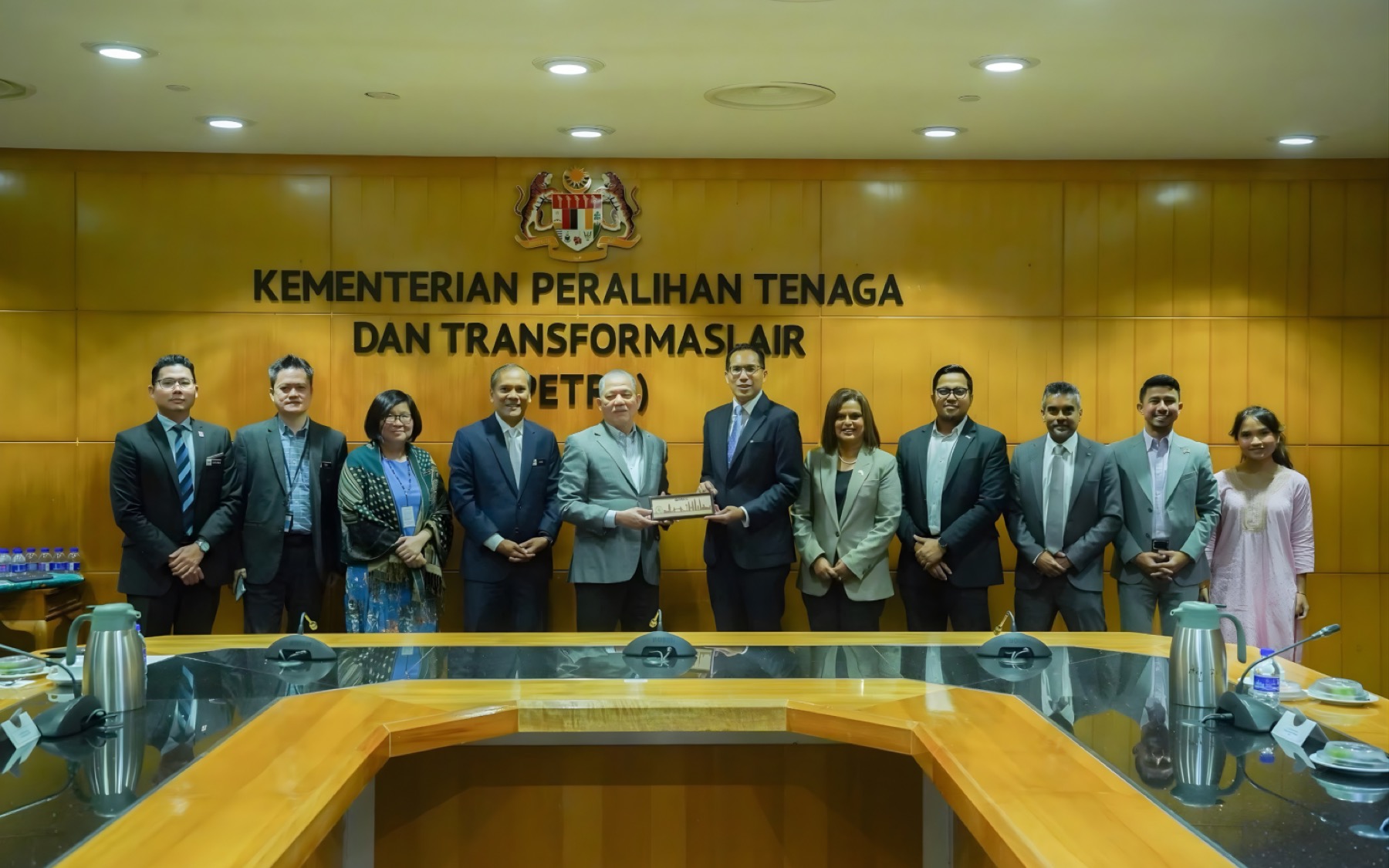 A BMCC delegation in a Malaysian ministry meeting room
