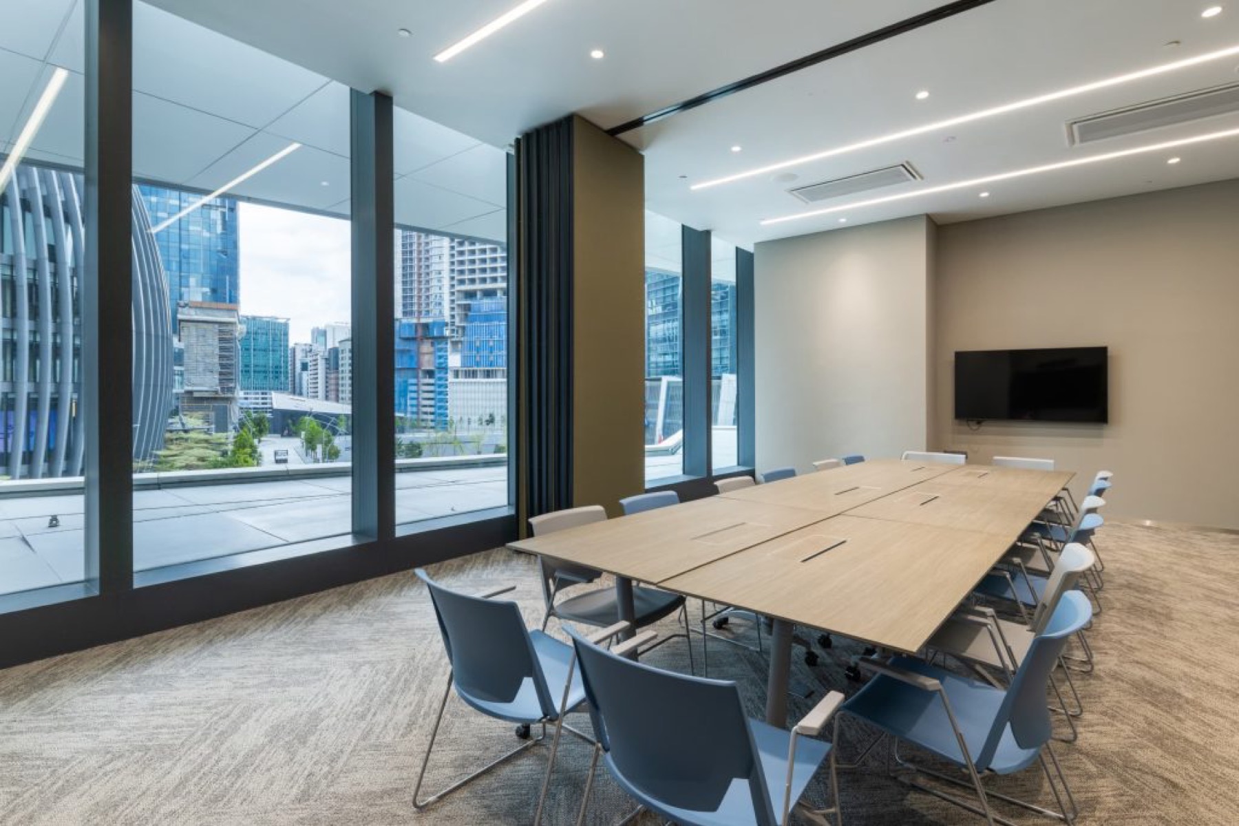 A BMCC meeting room at Menara IQ with a view over Kuala Lumpur